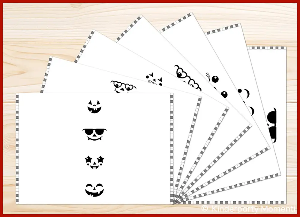 Halloween Vorlagen für Flaschenetiketten zum selber drucken Sieben ausgedruckte A4 Flaschenetiketten Vorlagen mit fröhlichen Kürbisgesichtern liegen fächerförmig ausgebreitet auf einem Holztisch