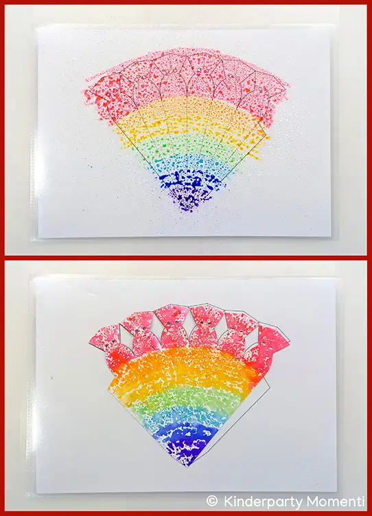 Zwei bunte Regenbogen-Schultüten mit Mustern auf weißem Hintergrund
